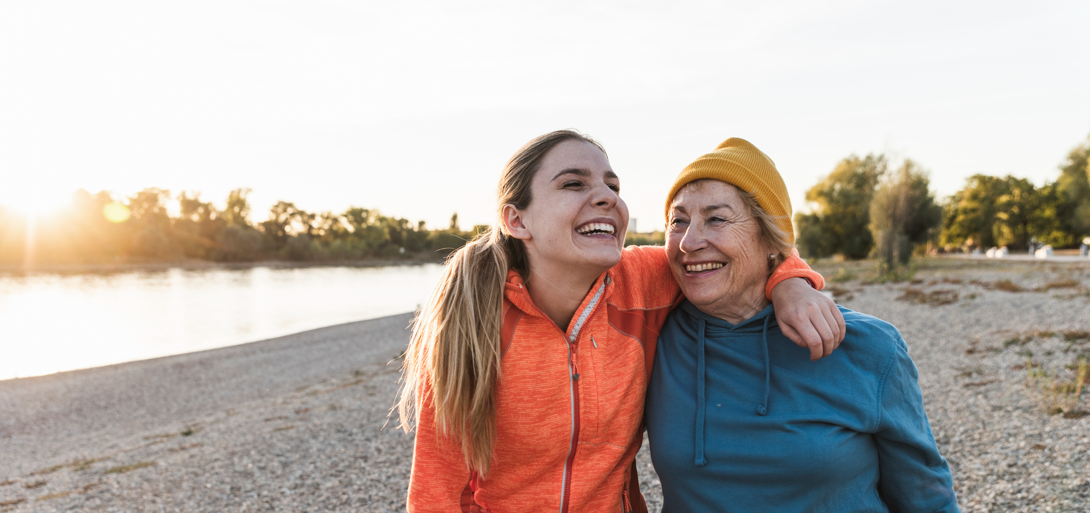 young woman, older woman at the beach